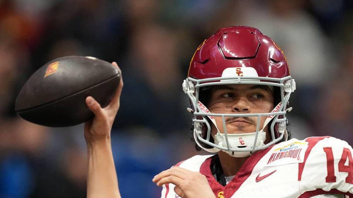  Dec 30, 2025; San Antonio, TX, USA; Southern California Trojans quarterback Jayden Maiava (14) throws the ball against the TCU Horned Frogs in the first half during the Alamo Bowl at Alamodome. Mandatory Credit: Kirby Lee-Imagn Images | Kirby Lee-Imagn Images 