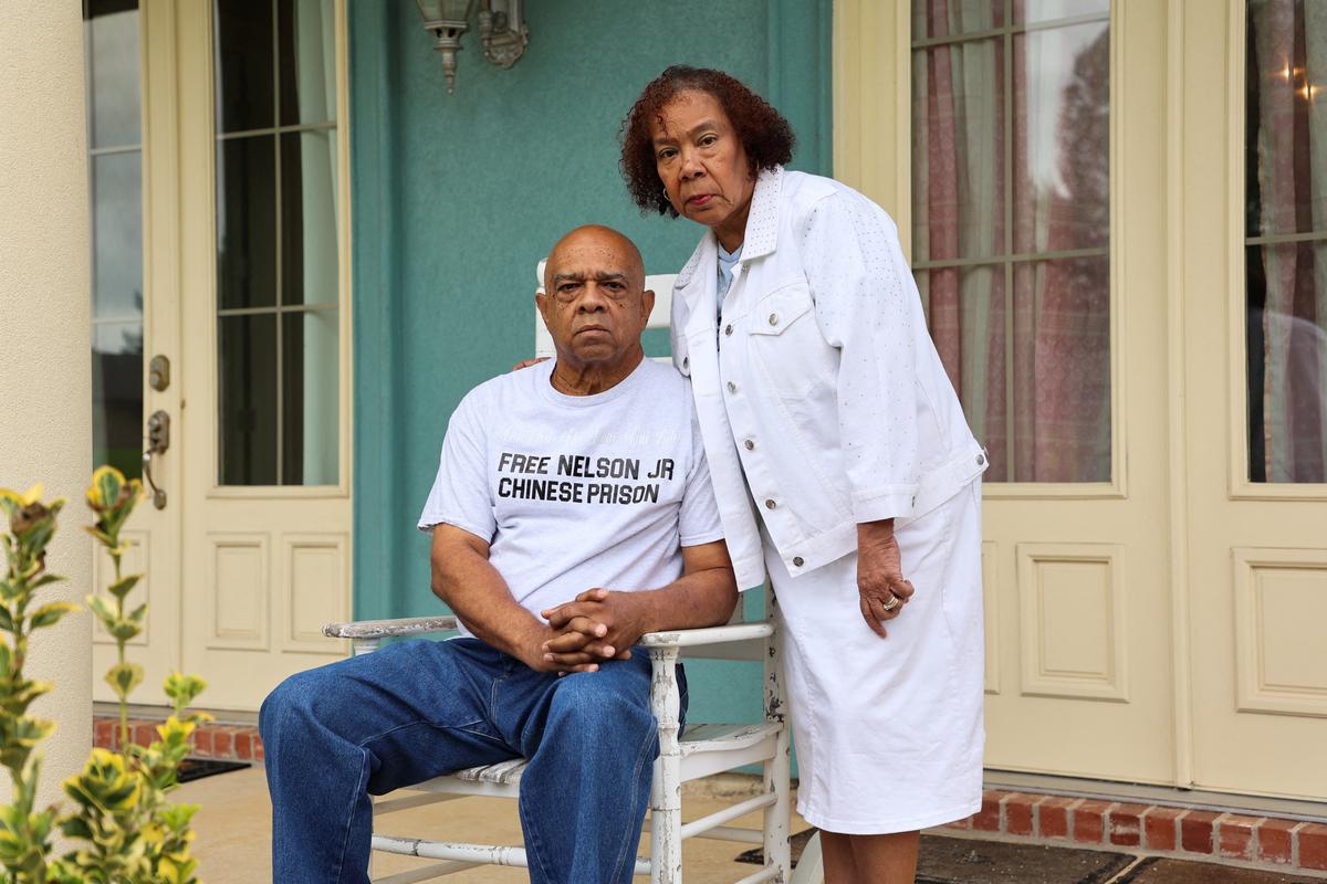 Cynthia and Nelson Wells, Sr. pose in front of their home in Haughton, Louisiana, U.S., April 30, 2026. The married couple fights for the release of their son Nelson Wells, Jr., who’s been imprisoned in China since 2014. REUTERS/Evan Garcia