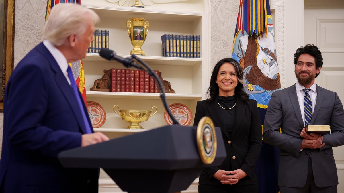 President Trump Swears In Tulsi Gabbard As Director Of National Intelligence. U.S. President Donald Trump, accompanied by Tulsi Gabbard and her husband Abraham Williams, speaks before Gabbard is sworn in as director of national intelligence in the Oval Office at the White House on February 12, 2025 in Washington, DC. 