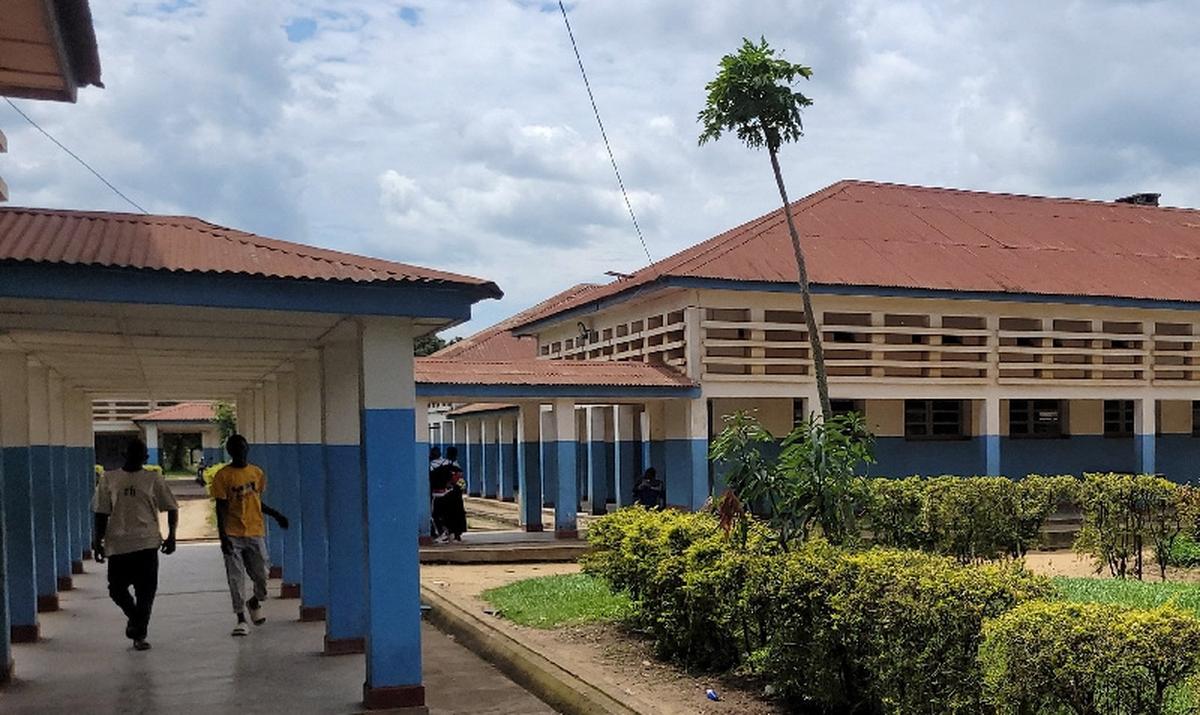 People walk at Bunia General Referral Hospital following confirmation of an Ebola outbreak involving the Bundibugyo strain in Bunia, Ituri province, Democratic Republic of Congo, May 16, 2026. Picture taken with a mobile phone. REUTERS/Victoire Mukenge