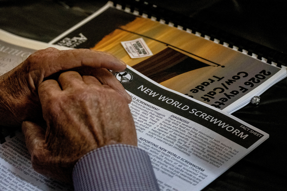 FILE PHOTO: A cattle rancher attends a presentation discussing the threat of the New World Screwworm parasite during the Fayette County Cow/Calf Clinic and Trade Show in La Grange, Texas, U.S., May 1, 2026.  REUTERS/Joel Angel Juarez/File Photo