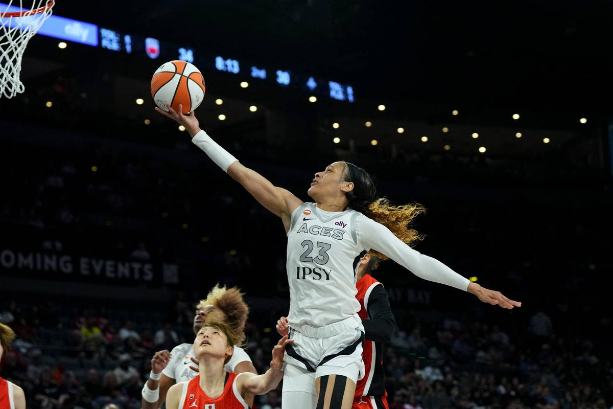  Las Vegas Aces guard Chennedy Carter soars for a layup during an exhibition game against Team Japan at Michelob Ultra Arena on April 26, 2026. Candice Ward-Imagn Images