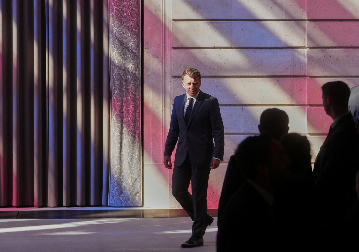 FILE PHOTO: French President Emmanuel Macron arrives to a ceremony marking the 25th anniversary of the law recognizing the slave trade and slavery as crimes against humanity at the Elysee Palace in Paris, May 21, 2026. Thibault Camus/Pool via REUTERS/File Photo