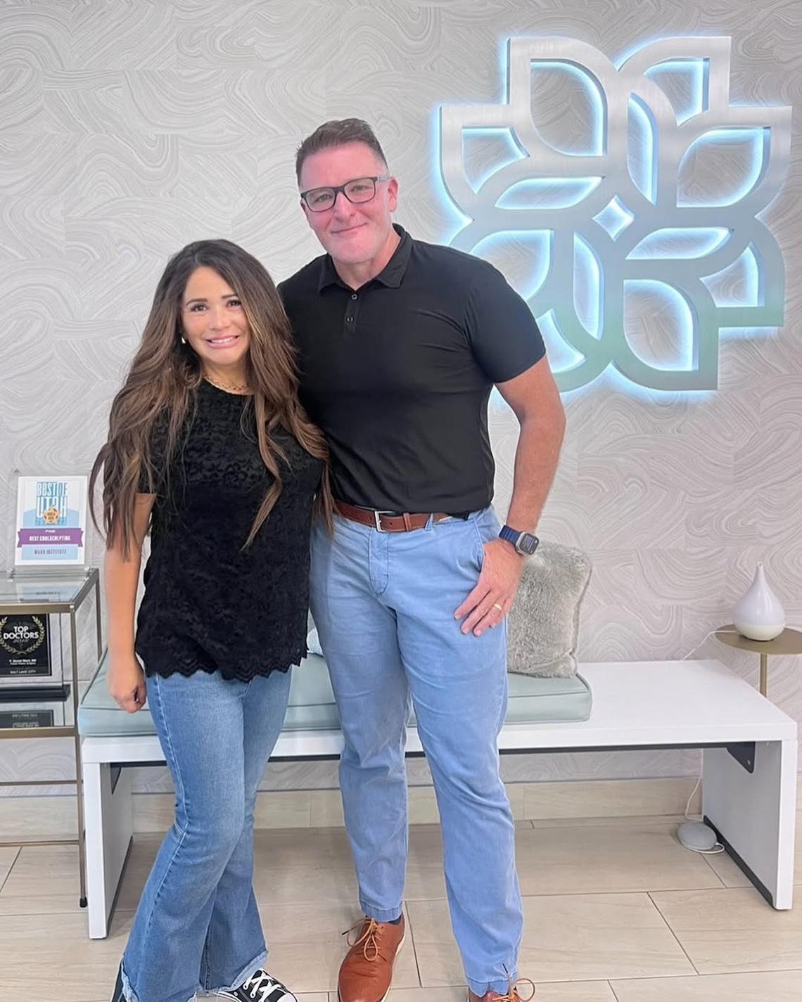 2024 Liann took a picture with her surgeon, where she looked so happy with the plastic surgery results. Lisa May/ Instagram