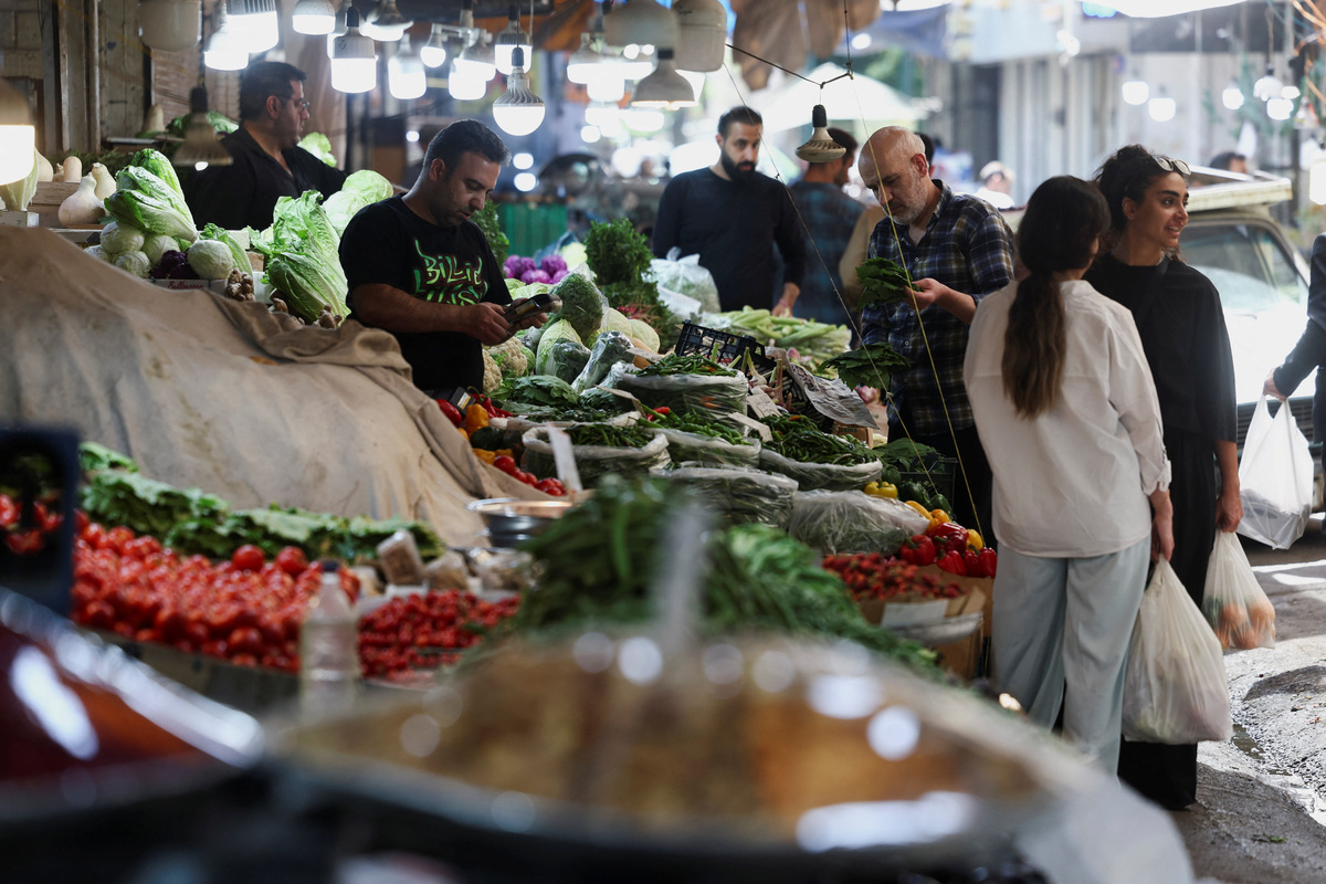 Iranian women shop in a local market in Tehran, Iran, June 11, 2026. Majid Asgaripour/WANA (West Asia News Agency) via REUTERS