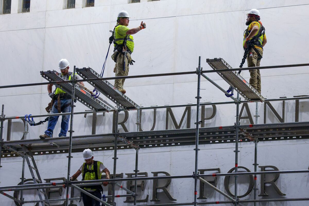  Construction crews build scaffolding outside The Kennedy Center on June 13, 2026, in preparation for removing President Donald Trump’s name from the building. 