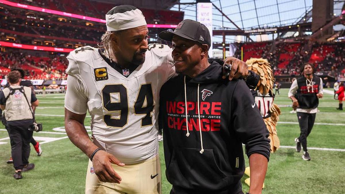  Jan 4, 2026; Atlanta, Georgia, USA; New Orleans Saints defensive end Cameron Jordan (94) walks with Atlanta Falcons head coach Raheem Morris after a game at Mercedes-Benz Stadium. Mandatory Credit: Brett Davis-Imagn Images | Brett Davis-Imagn Images 