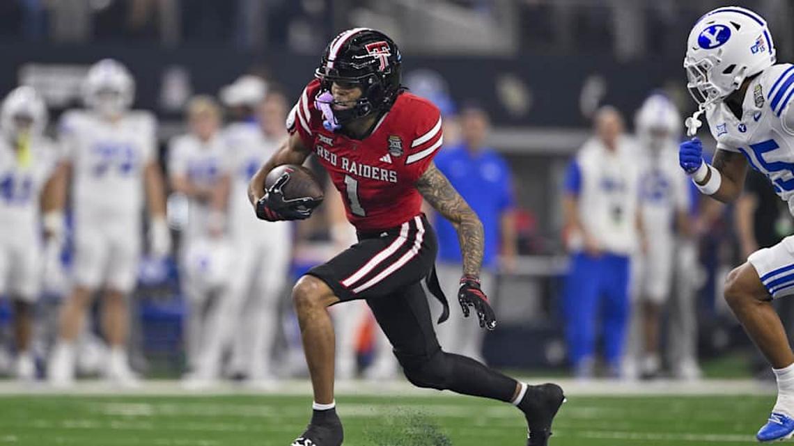  Dec 6, 2025; Arlington, TX, USA; Texas Tech Red Raiders wide receiver Reggie Virgil (1) runs with the ball during the game between the Red Raiders and the Cougars at AT&T Stadium. Mandatory Credit: Jerome Miron-Imagn Images | Jerome Miron-Imagn Images 