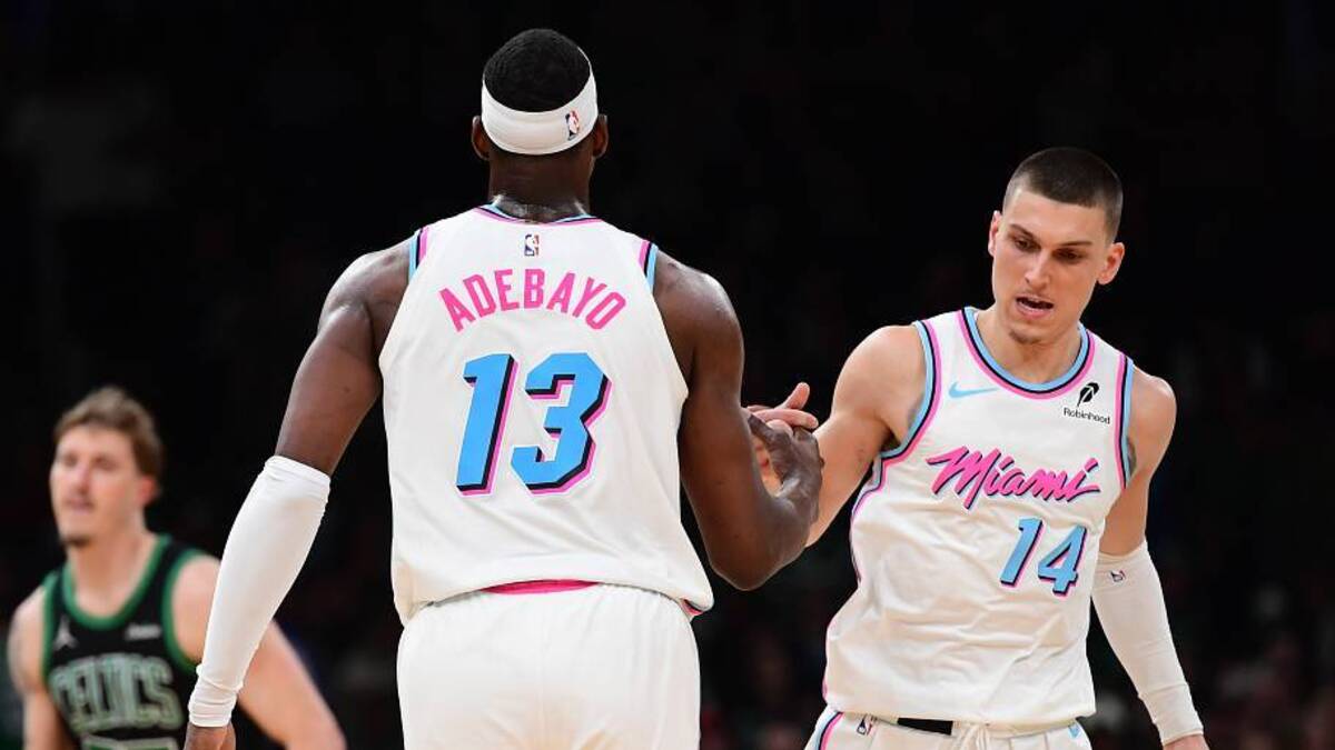  Apr 2, 2025; Boston, Massachusetts, USA; Miami Heat center Bam Adebayo (13) is congratulated by guard Tyler Herro (14) after making a basket during the second half against the Boston Celtics at TD Garden. Mandatory Credit: Bob DeChiara-Imagn Images | IMAGN IMAGES via Reuters Connect 