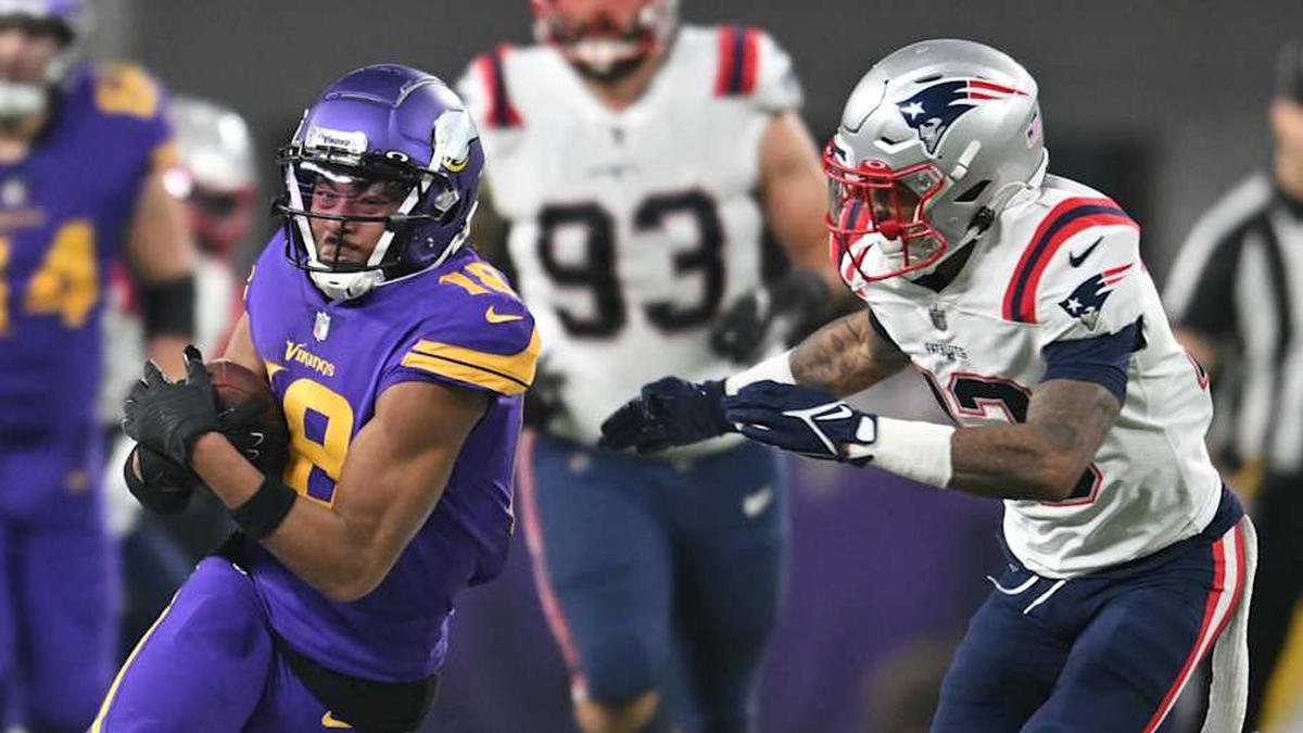  Nov 24, 2022; Minneapolis, Minnesota, USA; Minnesota Vikings wide receiver Justin Jefferson (18) and New England Patriots cornerback Jack Jones (13) in action during the game at U.S. Bank Stadium. Mandatory Credit: Jeffrey Becker-Imagn Images | Jeffrey Becker-Imagn Images 