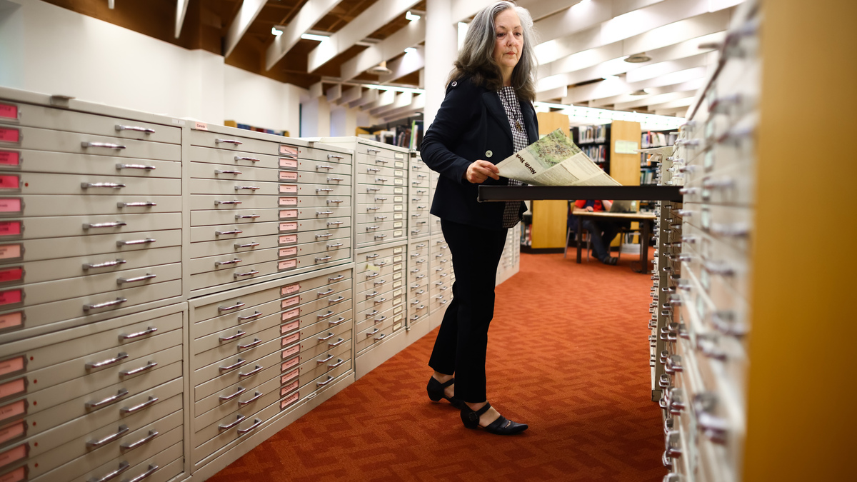 Theresa McVean, chair of the Canada Chapter Association of Professional Genealogists, at the Toronto Reference Library in Canada on June 8, 2026. Six months after Canada expanded its citizenship eligibility, requests are flooding in for archival records. The documents are vital for proving ties to the country.