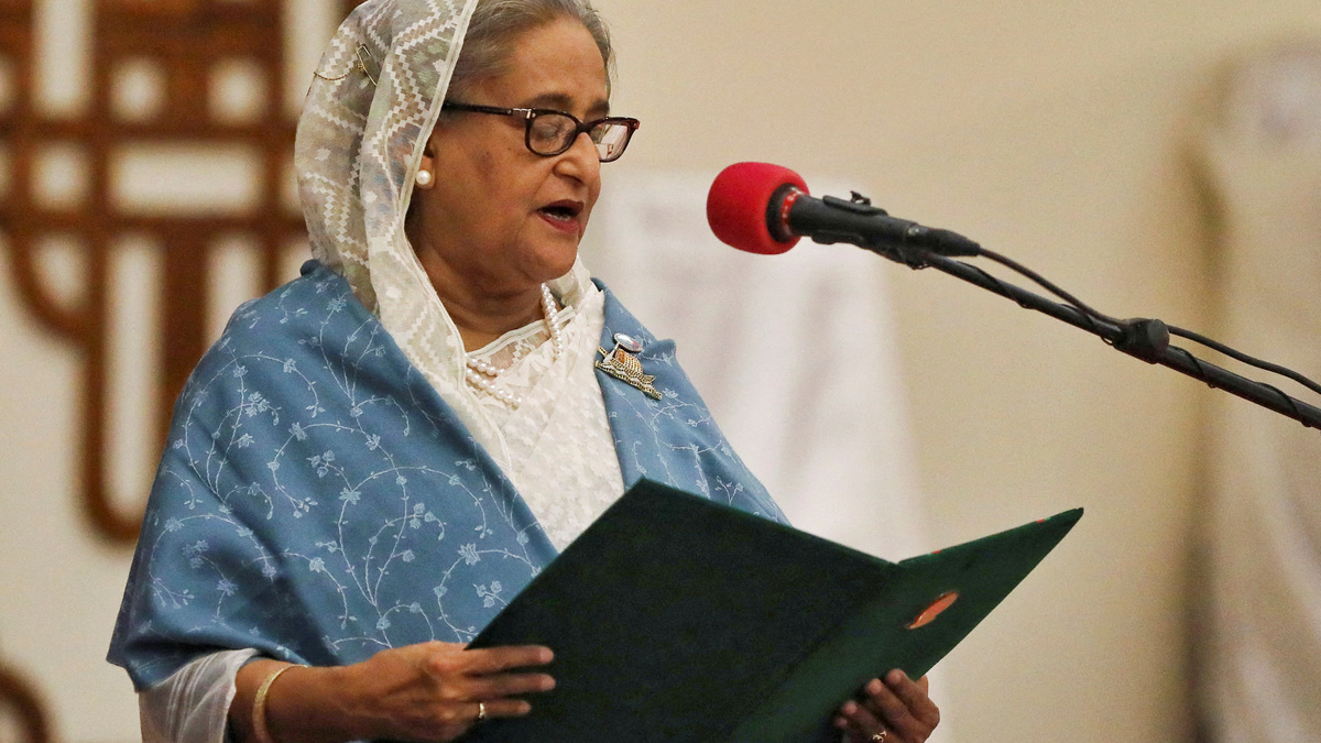 FILE PHOTO: Prime Minister Sheikh Hasina takes oath as the country's Prime Minister at the Bangabhaban in Dhaka, Bangladesh, January 11, 2024. REUTERS/Mohammad Ponir Hossain/File Photo