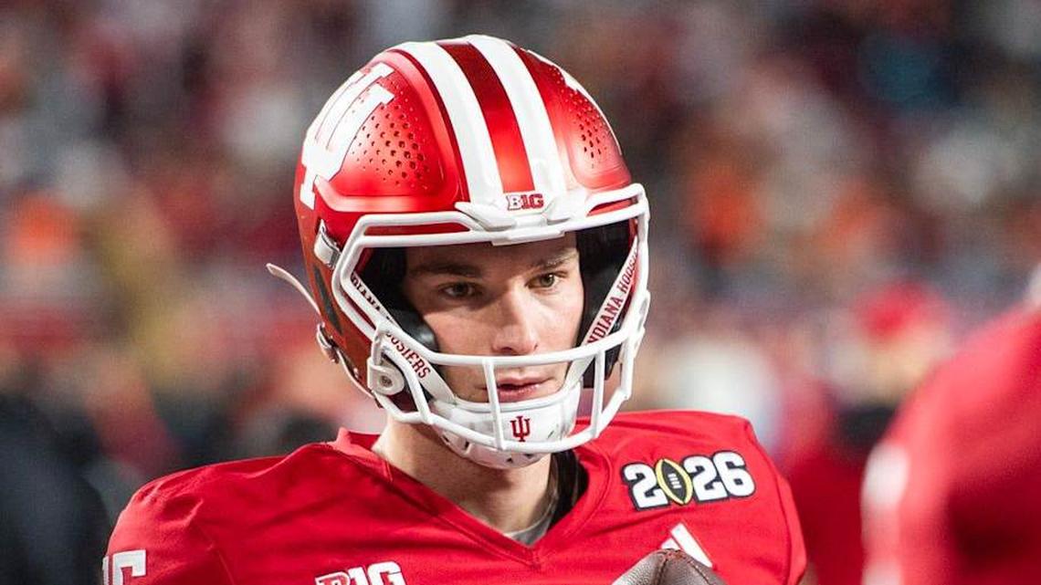  Indiana's Fernando Mendoza (15) gets loose before the College Football Playoff National Championship college football game at Hard Rock Stadium in Miami Gardens on Monday, Jan. 19, 2026. | Rich Janzaruk/Herald-Times / USA TODAY NETWORK via Imagn Images 
