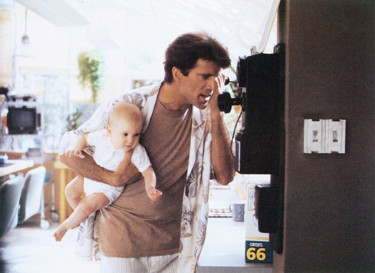 Lisa/Michelle Blair, Ted Danson, Three Men and a Baby, 1987© Buena Vista/courtesy Everett Collection