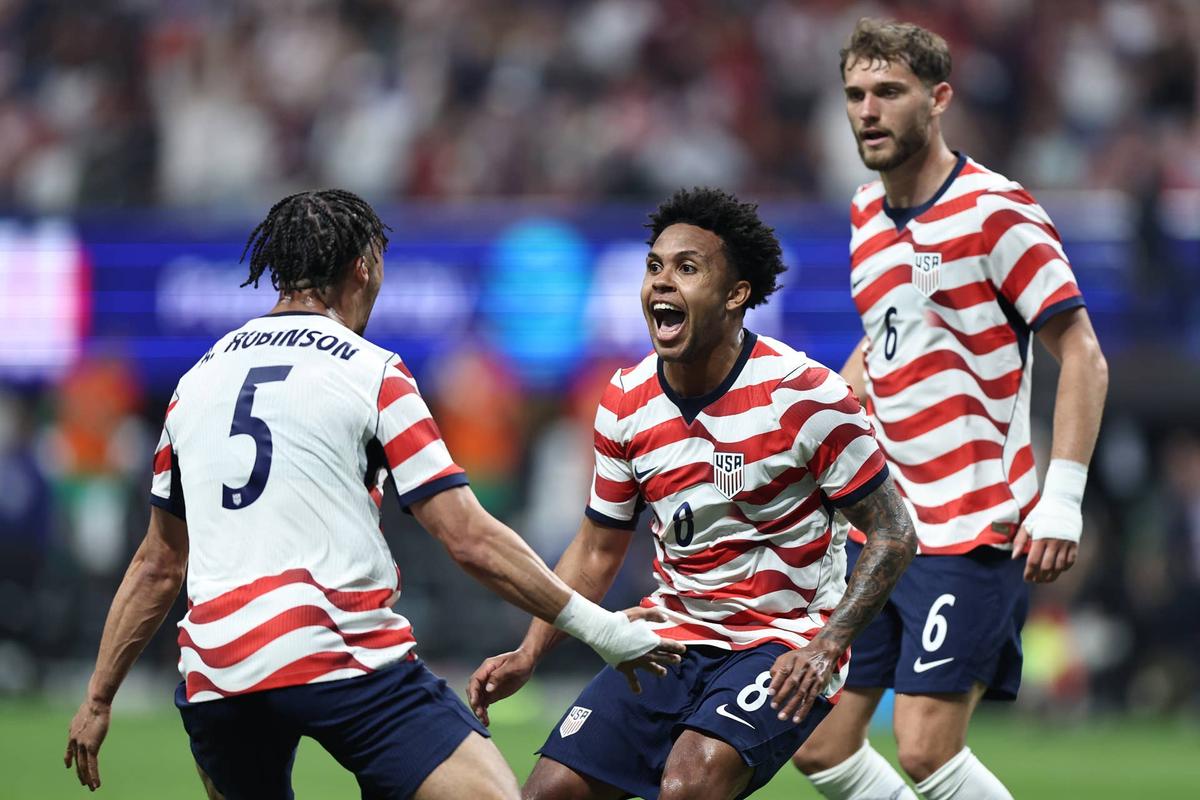  Weston McKennie #8 of the United States after scoring the opening goal with Antonee Robinson #5 during the first half against Belgium during an international friendly at Mercedes-Benz Stadium on March 28, 2026 in Atlanta, Georgia. (Photo by Omar Vega/USSF/Getty Images) Photo by Omar Vega/USSF/Getty Images