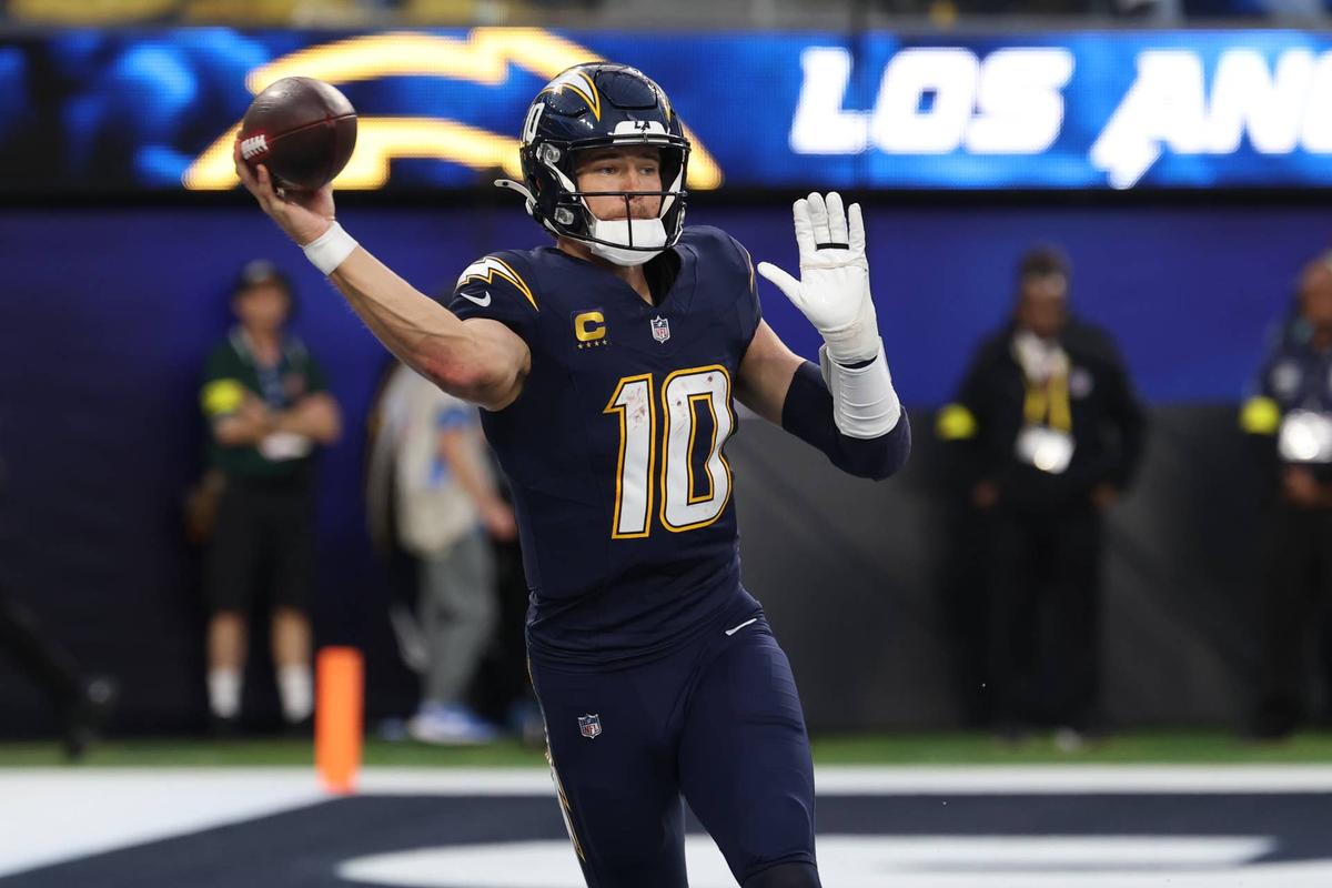  Dec 27, 2025; Inglewood, California, USA; Los Angeles Chargers quarterback Justin Herbert (10) throws a pass against the Houston Texans during the second half at SoFi Stadium. Mandatory Credit: Kiyoshi Mio-Imagn Images 