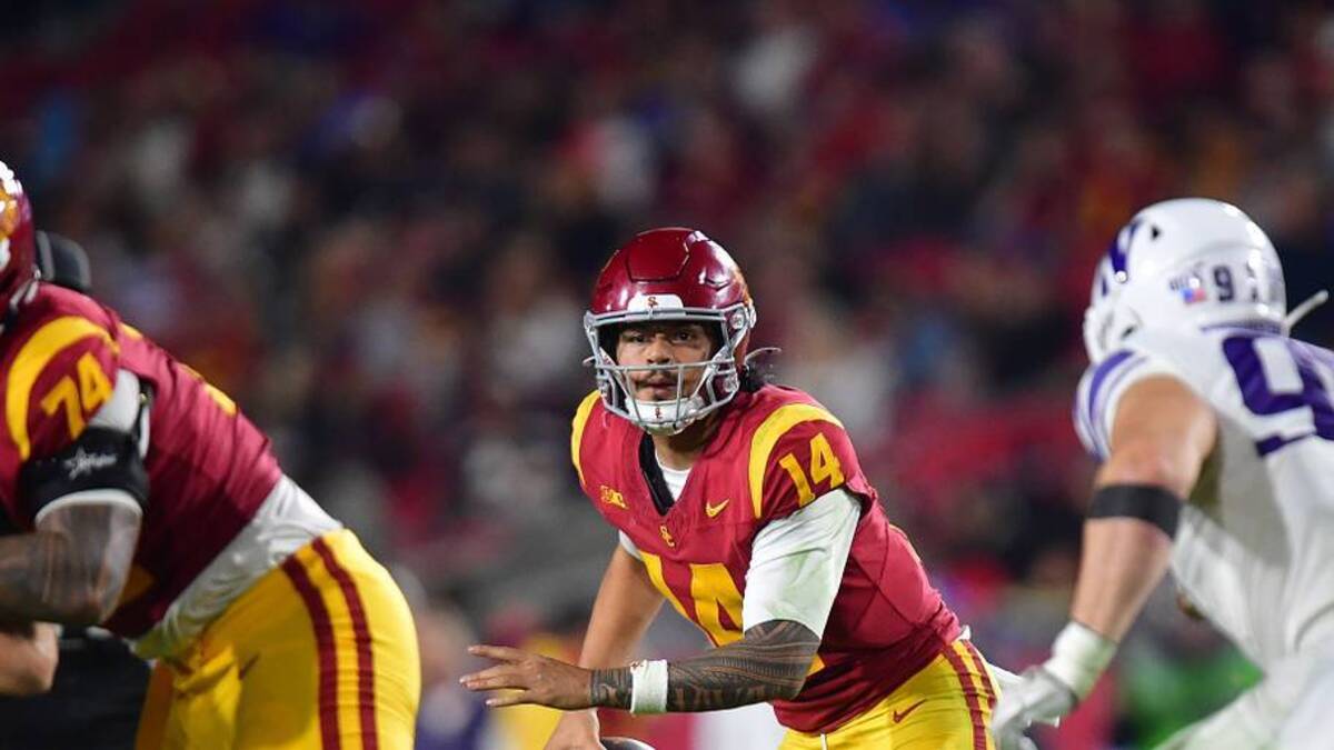  Nov 7, 2025; Los Angeles, California, USA; Southern California Trojans quarterback Jayden Maiava (14) moves out to pass against the Northwestern Wildcats during the second half at the Los Angeles Memorial Coliseum. Mandatory Credit: Gary A. Vasquez-Imagn Images | IMAGN IMAGES via Reuters Connect 