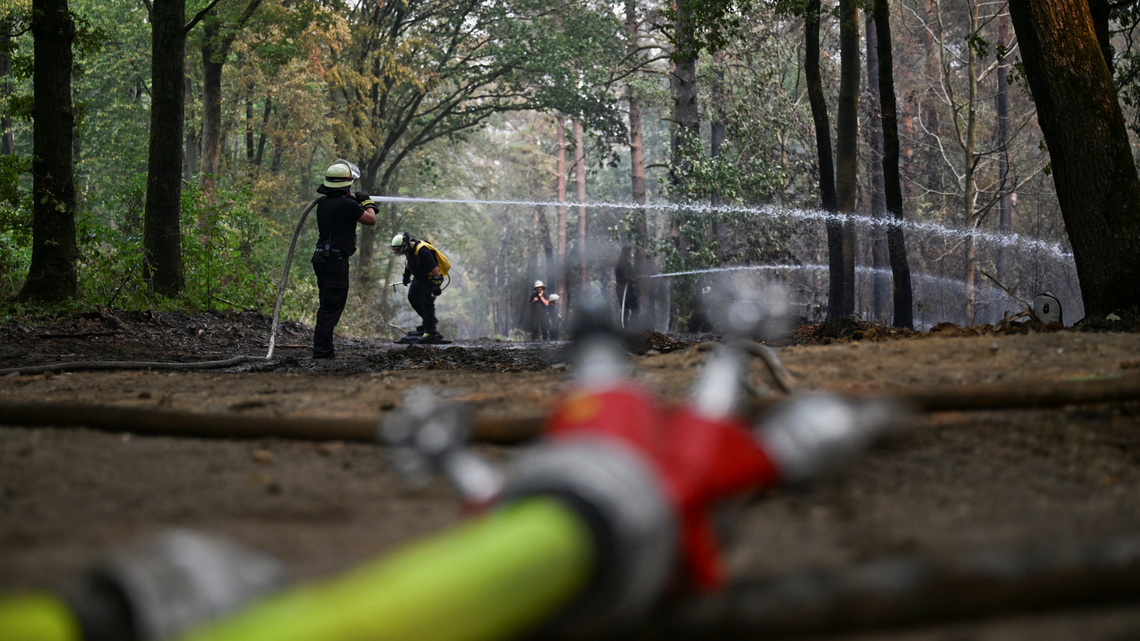 German wildfire near Belgian border under control, local authorities say 
