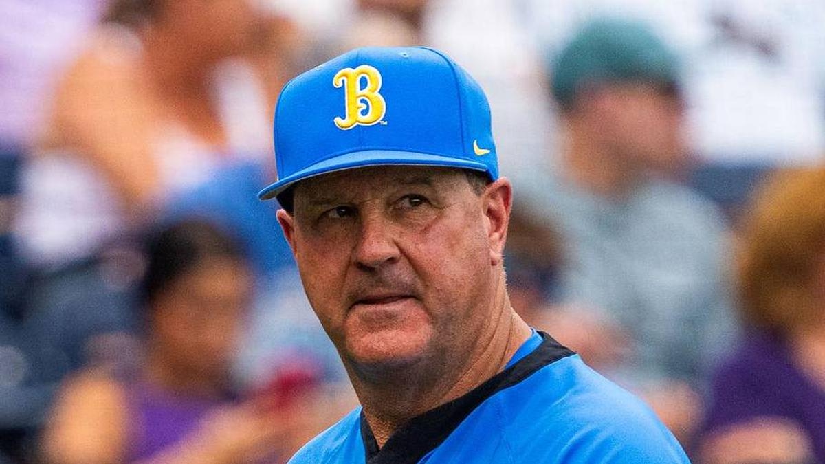  Jun 16, 2025; Omaha, Neb, USA; UCLA Bruins head coach John Savage walks off the field before the game against the LSU Tigers at Charles Schwab Field. Mandatory Credit: Dylan Widger-Imagn Images | Dylan Widger-Imagn Images 