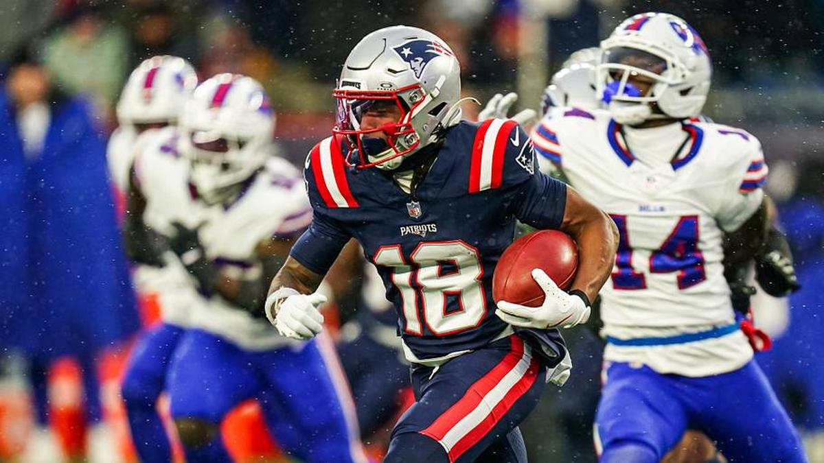  Dec 14, 2025; Foxborough, Massachusetts, USA; New England Patriots wide receiver Kyle Williams (18) runs the ball against the Buffalo Bills in the second half at Gillette Stadium. Mandatory Credit: David Butler II-Imagn Images | David Butler II-Imagn Images 