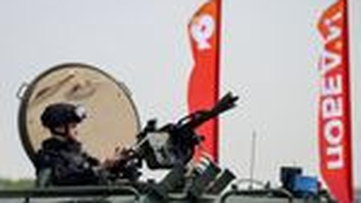 A Russian security officer remains atop an all-terrain infantry mobility vehicle amid increased security measures taken ahead of Victory Day, marking the anniversary of victory over Nazi Germany in World War Two, in central Moscow, Russia, May 7, 2026. REUTERS/Stringer