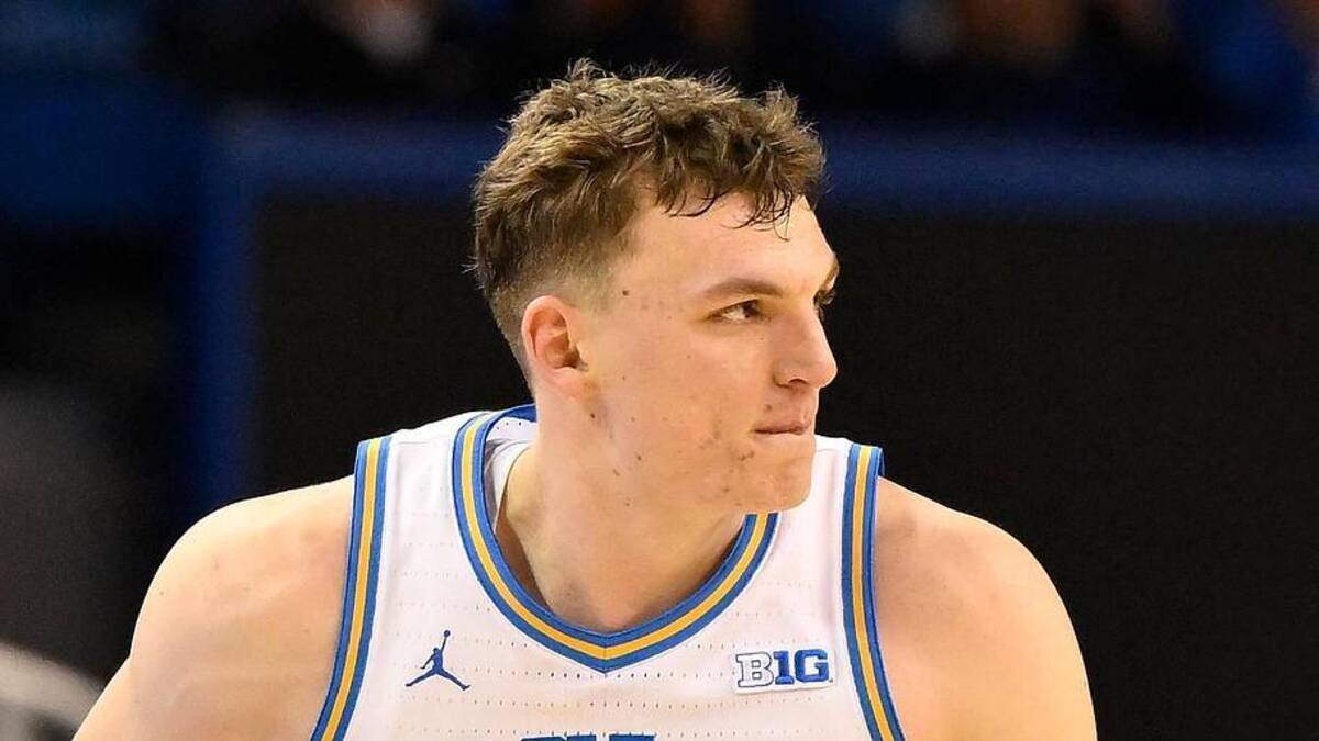  Feb 21, 2026; Los Angeles, California, USA; UCLA forward Tyler Bilodeau (34) runs back on defense after scoring a three-point basket during the second half against the Illinois Fighting Illini at Pauley Pavilion presented by Wescom Financial. Mandatory Credit: Robert Hanashiro-Imagn Images | Robert Hanashiro-Imagn Images 