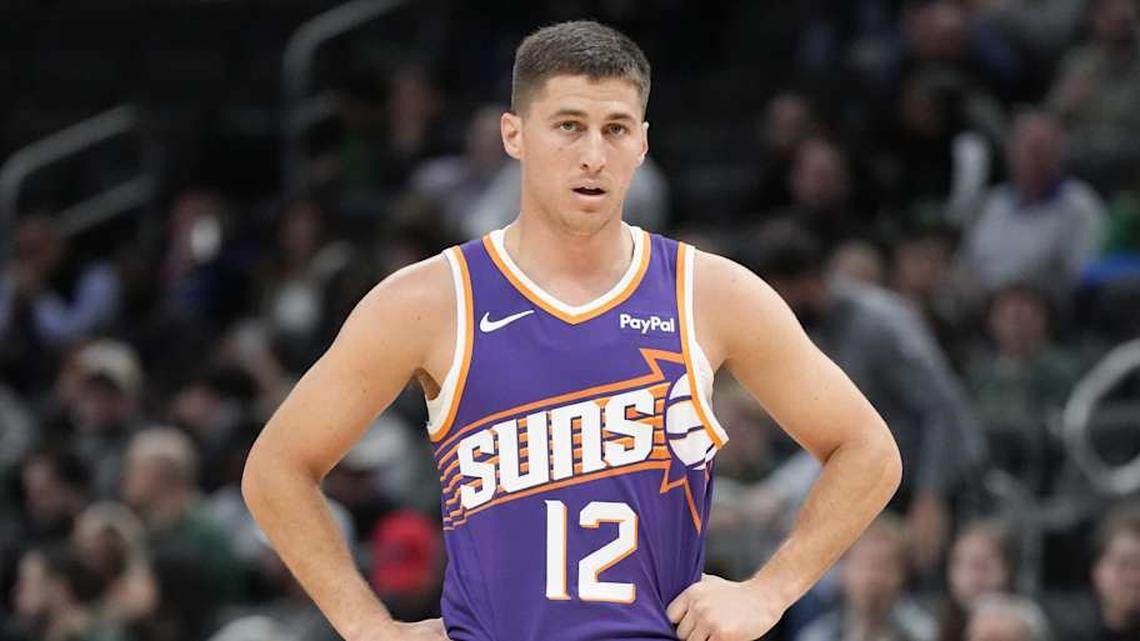  Mar 10, 2026; Milwaukee, Wisconsin, USA; Phoenix Suns guard Collin Gillespie (12) during the game against the Milwaukee Bucks at Fiserv Forum. | Jeff Hanisch-Imagn Images 