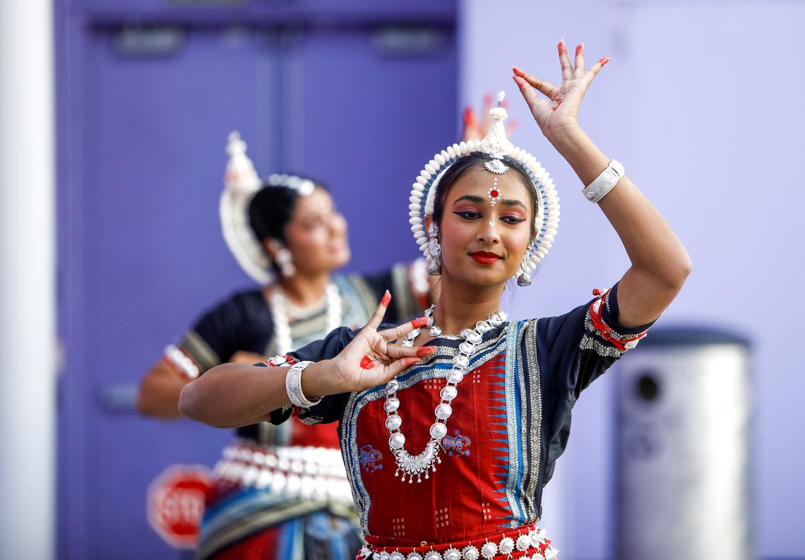 Shylaa Karan, center, 15, of San Jose, and Ankita Nag,14, of San Jose, dance during a Diwali celebration in San Jose in 2022. Diwali, a religious festival of lights, usually lasts five days and is celebrated during the Hindu lunisolar month Kartika.