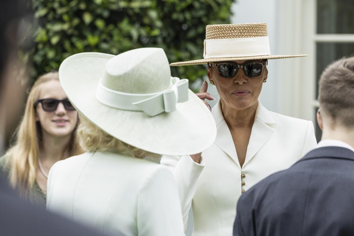 First lady Melania Trump tries on Ray-Ban Meta AI glasses at the "exploring U.S.-U.K. History through Innovation" event with Queen Camilla, foreground, at the White House Tennis Pavilion at the White House campus in Washington, on Tuesday, April 28, 2026. (Anna Rose Layden/The New York Times)