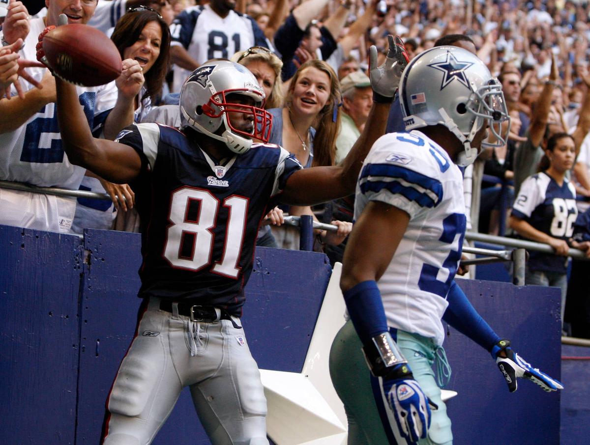  New England Patriots receiver Randy Moss in action against the Dallas Cowboys at Texas Stadium. Matthew Emmons-USA TODAY Sports