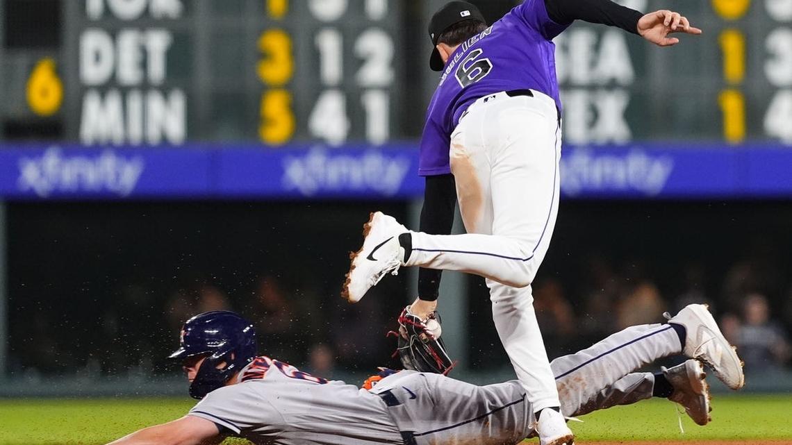 Rockies' 8-run inning just enough to down Astros 