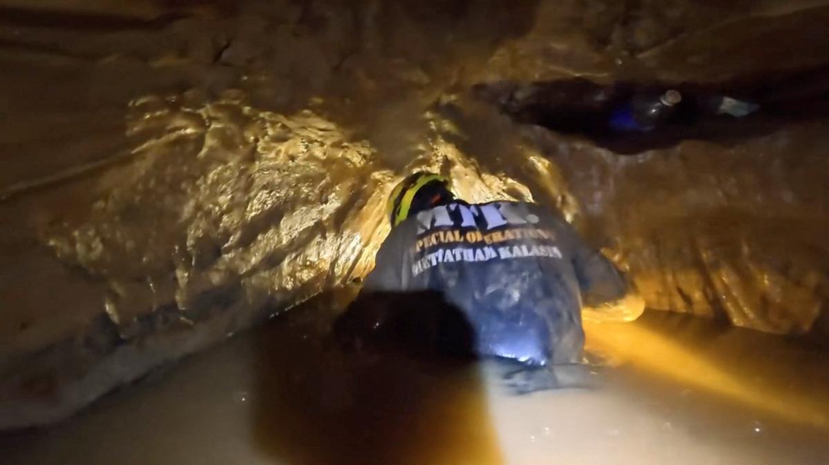 A member of a rescue team works to save people trapped in a cave, in Xaisomboun Province, Laos, May 25, 2026, in this screengrab taken from a handout video. Metta Tham Kalasin Rescue/Handout via REUTERS