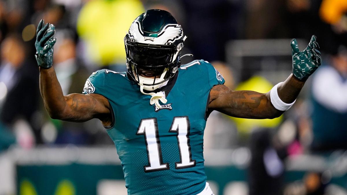 Philadelphia Eagles wide receiver A.J. Brown reacts after teammate Boston Scott scored on a touchdown run against the New York Giants during the first half of an NFL divisional round playoff football game, Saturday, Jan. 21, 2023, in Philadelphia. (AP Photo/Chris Szagola)