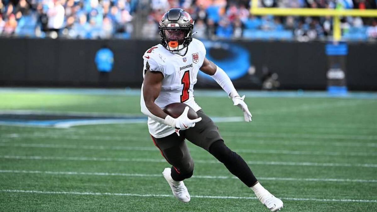  Dec 21, 2025; Charlotte, North Carolina, USA; Tampa Bay Buccaneers running back Rachaad White (1) with the ball in the third quarter at Bank of America Stadium. | Bob Donnan-Imagn Images 