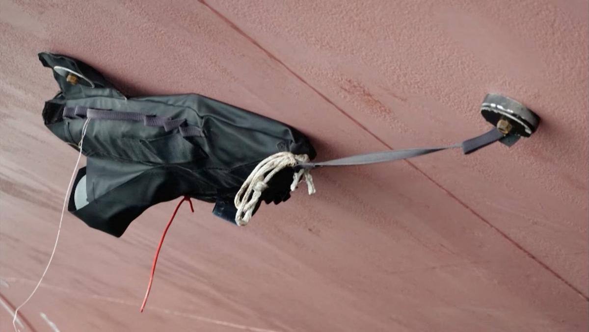 A still image from a video released by Russian state media shows what is said to be a mine found on the hull of the Liberia-flagged tanker Arrhenius in the Baltic Sea port of Ust-Luga in the Leningraad region, Russia, the video released on May 25, 2026. Russian State Media/Handout via REUTERS
