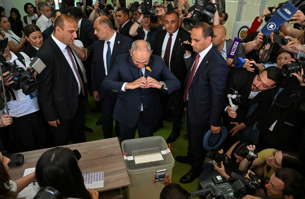Armenian Prime Minister and leader of the Civil Contract party Nikol Pashinyan gestures after casting a ballot at a polling station during a parliamentary election in Yerevan, Armenia, June 7, 2026. Stringer/Photolure via REUTERS