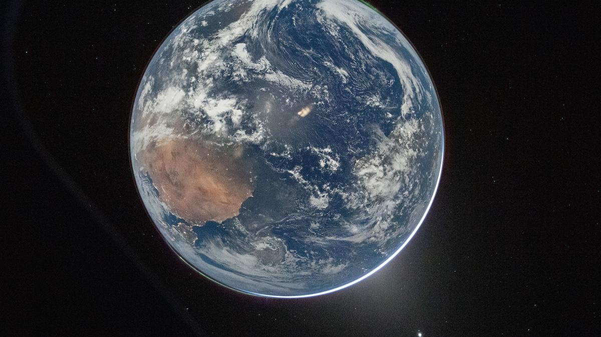 NASA astronaut and Artemis II Commander Reid Wiseman took this picture of Earth from the Orion spacecraft's window on April 2, 2026, after completing the translunar injection burn. (Reid Wiseman/NASA/TNS)