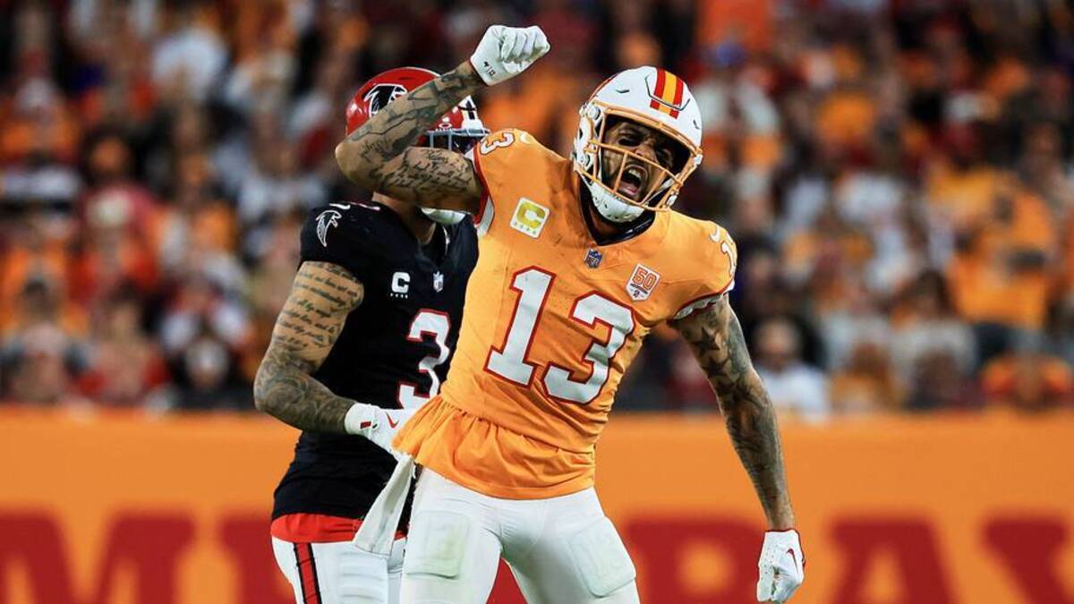  Dec 11, 2025; Tampa, Florida, USA; Tampa Bay Buccaneers wide receiver Mike Evans (13) reacts after catching a pass against Atlanta Falcons safety Jessie Bates III (3) (obscured) during the third quarter at Raymond James Stadium. Mandatory Credit: Kim Klement Neitzel-Imagn Images | Kim Klement Neitzel-Imagn Images 