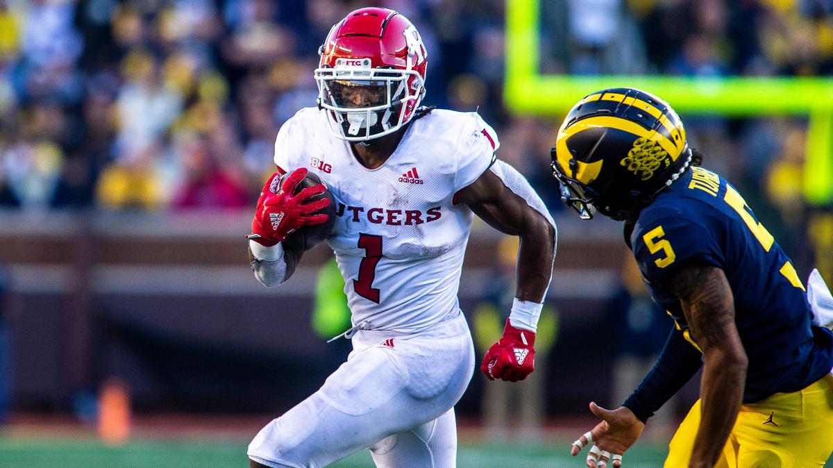 Rutgers running back Isiah Pacheco (1) rushes against Michigan defensive back DJ Turner (5) in the fourth quarter of an NCAA college football game in Ann Arbor, Mich., Saturday, Sept. 25, 2021. Michigan won 20-13.