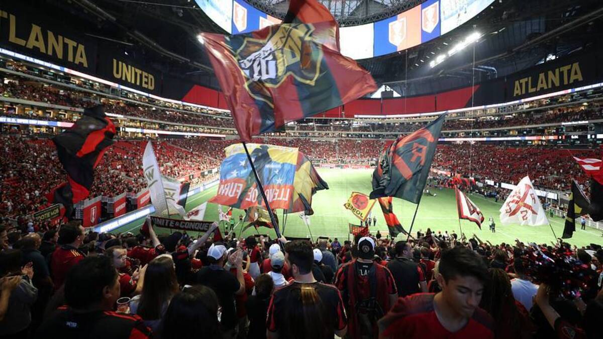  A standout feature of the stadium is a cutting-edge retractable roof divided into eight sliding petals. | Simon Bruty/Sports Illustrated 