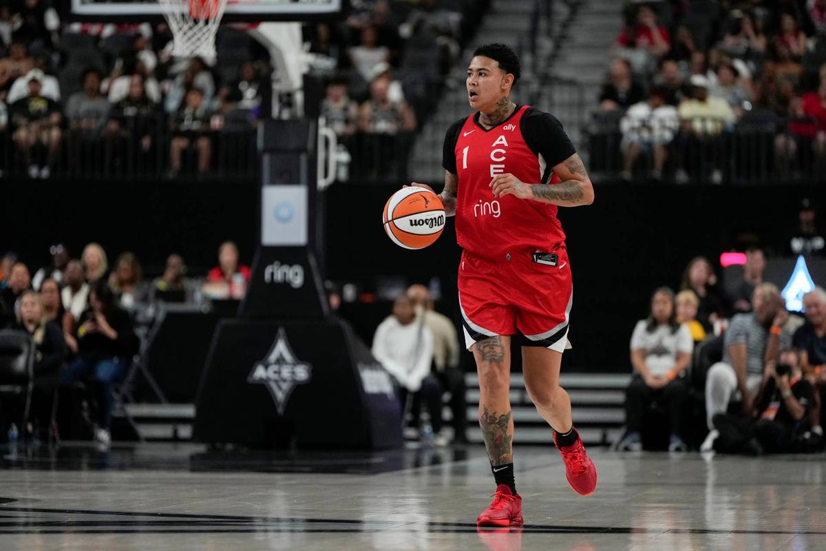  Las Vegas Aces forward Kierstan Bell brings the ball upcourt during a game against the Chicago Sky at T-Mobile Arena on Sept. 7, 2025. Lucas Peltier-Imagn Images
