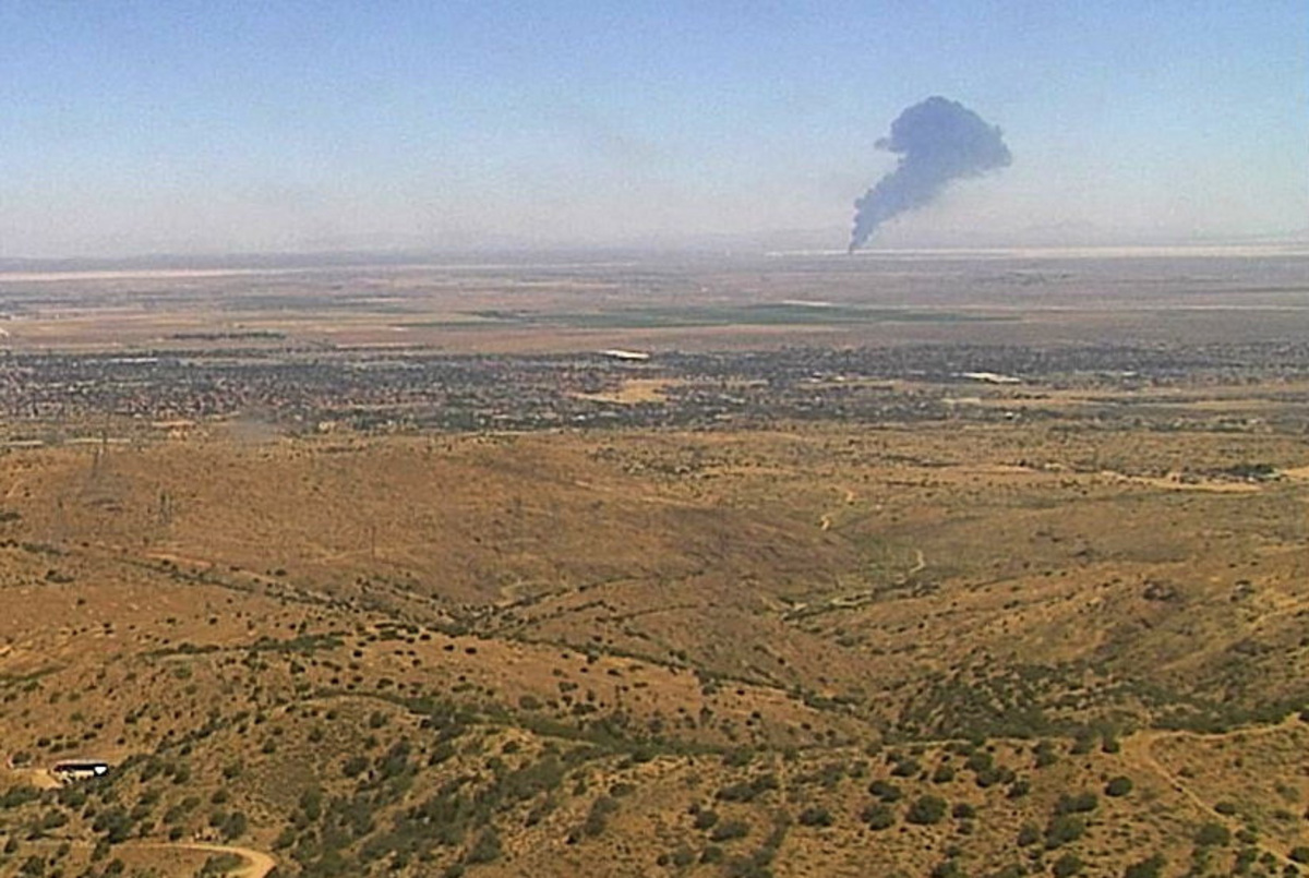 Smoke rises from Edwards Air Force Base after the crash of a U.S. Air Force B-52 bomber aircraft in Edwards, California, U.S., June 15, 2026, in a still image from an ALERTCalifornia fire surveillance camera. ALERTCalifornia/Handout via REUTERS