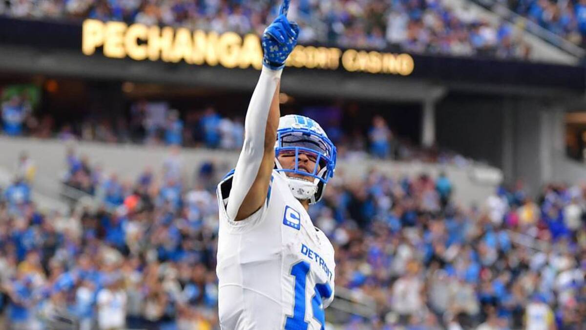  Dec 14, 2025; Inglewood, California, USA; Detroit Lions wide receiver Amon-Ra St. Brown (14) celebrates after a touchdown during the second quarter against the Los Angeles Rams at SoFi Stadium. Mandatory Credit: Gary A. Vasquez-Imagn Images | IMAGN IMAGES via Reuters Connect 