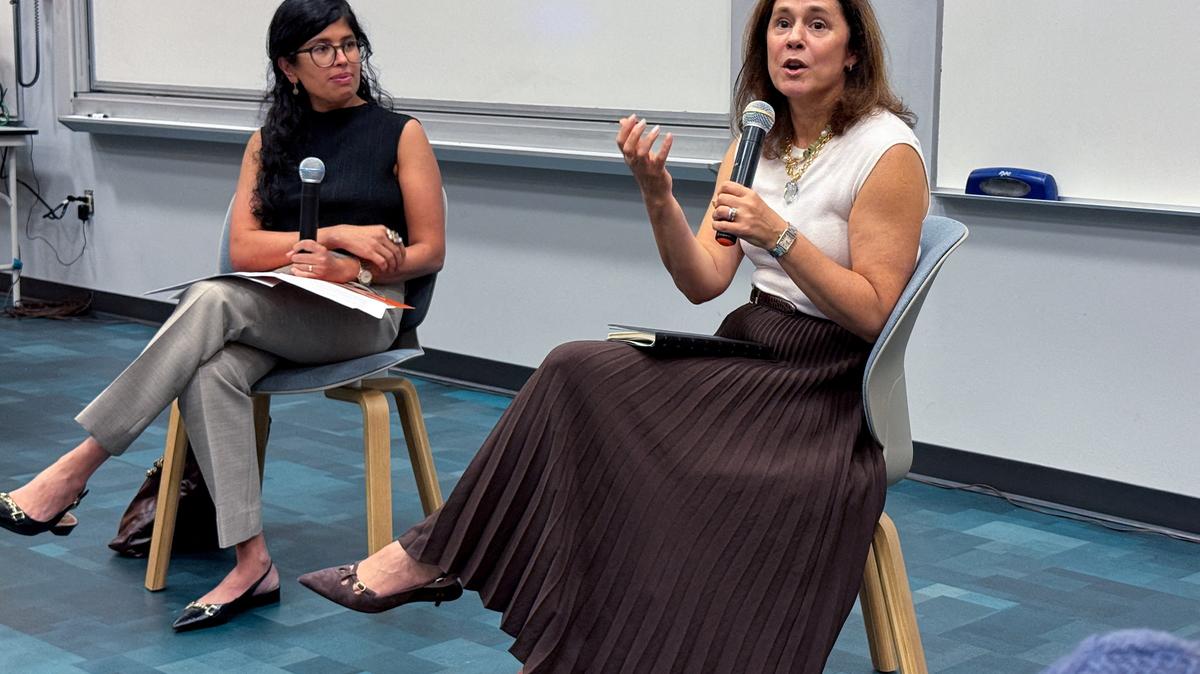 FILE PHOTO: Federal Reserve Bank of Dallas President Lorie Logan speaks with students at the University of Texas at Austin's Graduate School of Business, in Austin, Texas, U.S. October 2, 2025. REUTERS/Ann Saphir/File Photo