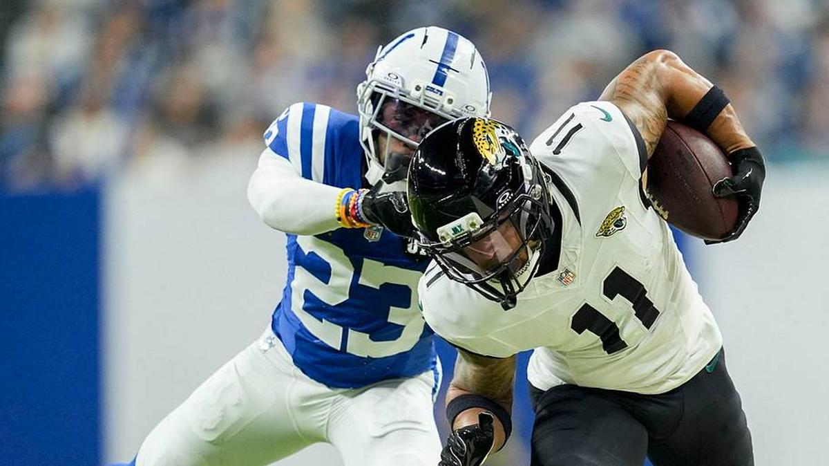 Indianapolis Colts cornerback Kenny Moore II (23) shoves Jacksonville Jaguars wide receiver Parker Washington (11) out of bounds Sunday, Dec. 28, 2025, during a game against the Jacksonville Jaguars at Lucas Oil Stadium in Indianapolis. 