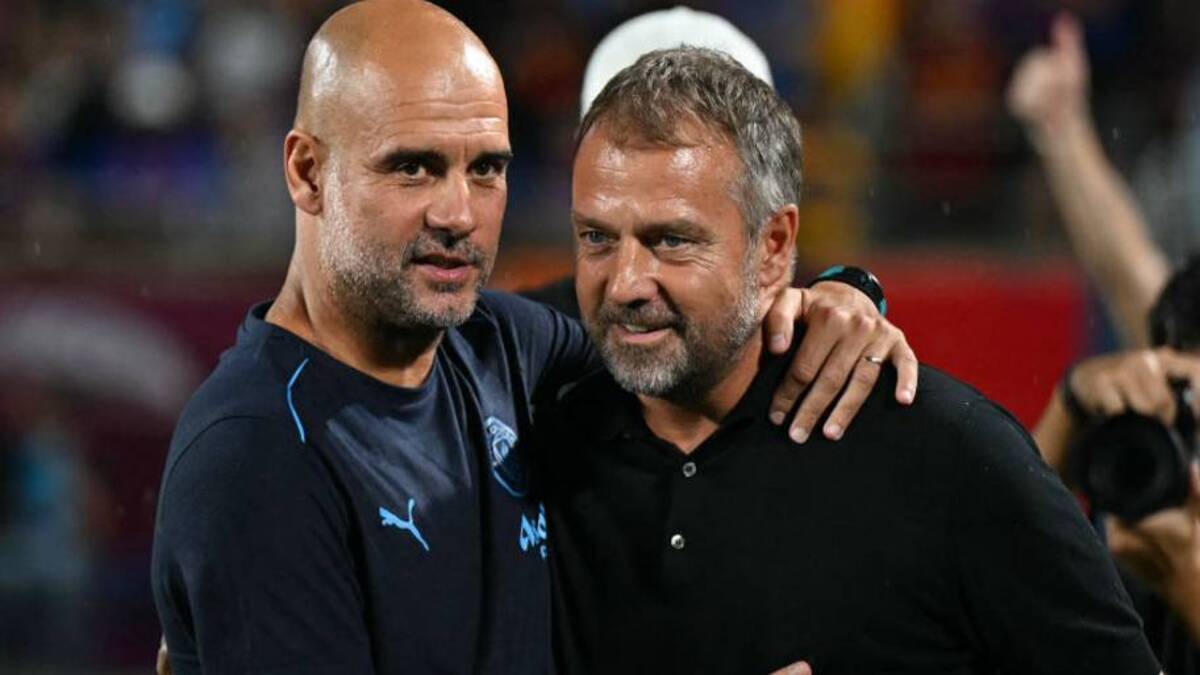  Pep Guardiola (left) admitted he's a fan of Hansi Flick. | Chandan Khanna/AFP/Getty Images 