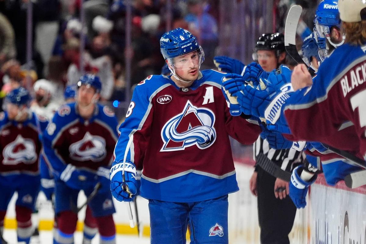  Colorado Avalanche defenseman Cale Makar (8) celebrates his goal scored against the Minnesota Wild during the third period in game one of the second round of the 2026 Stanley Cup Playoffs at Ball Arena. Ron Chenoy-Imagn Images