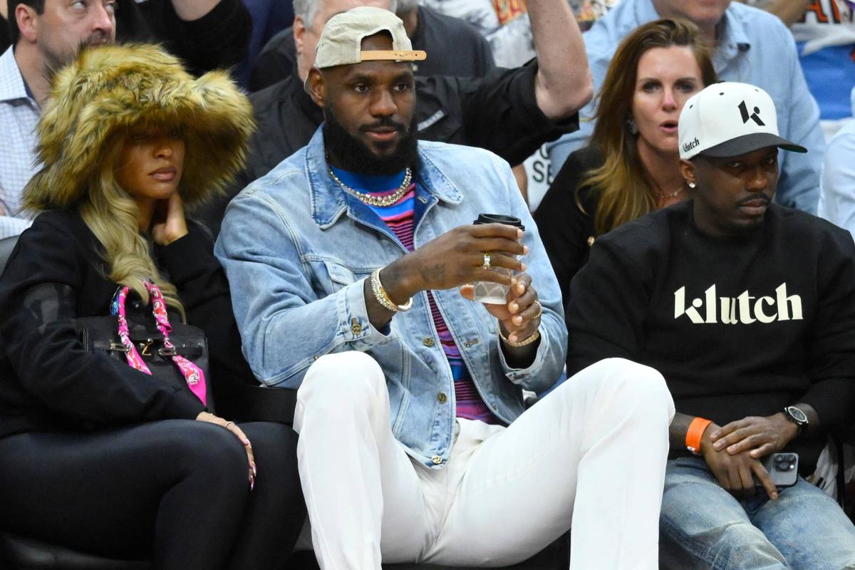  LeBron James (center) together with wife Savannah and agent Rich Paul David Richard-Imagn Images