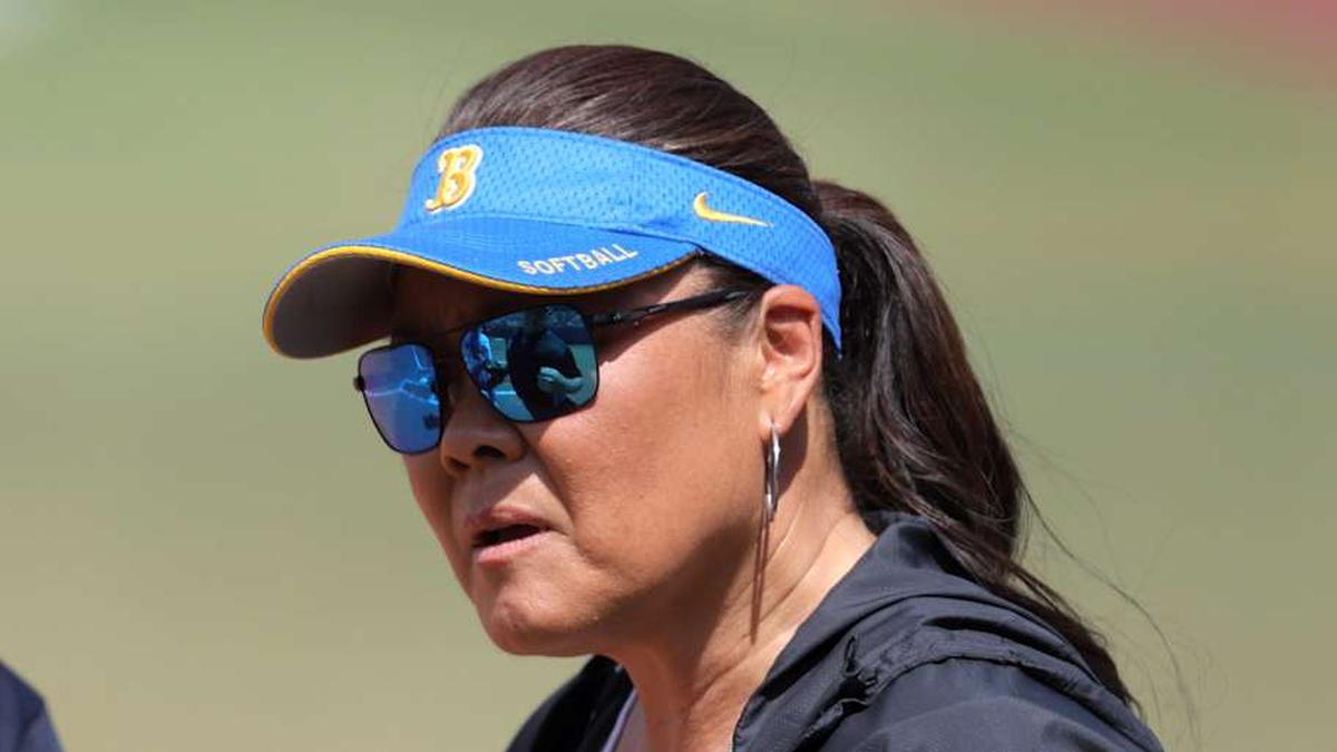  UCLA coach Kelly Inouye-Perez talks with an official during a Women's College World Series softball game between the University of Oklahoma Sooners (OU) and the UCLA Bruins at Devon Park in Oklahoma City, Saturday, June 1, 2024. Oklahoma won 1-0. | BRYAN TERRY/THE OKLAHOMAN / USA TODAY NETWORK 