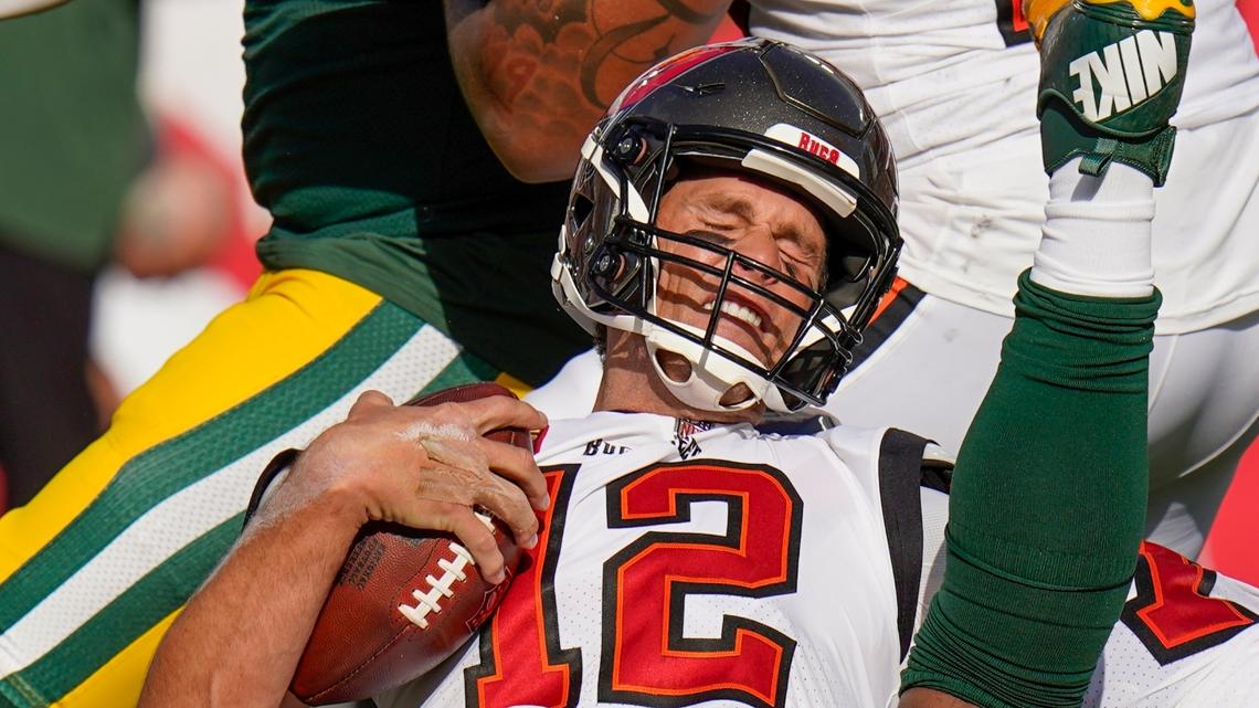 Green Bay Packers’ Rashan Gary sacks Tampa Bay Buccaneers’ Tom Brady during the first half of an NFL football game Sunday, Sept. 25, 2022, in Tampa, Fla. (AP Photo/Chris O’Meara)